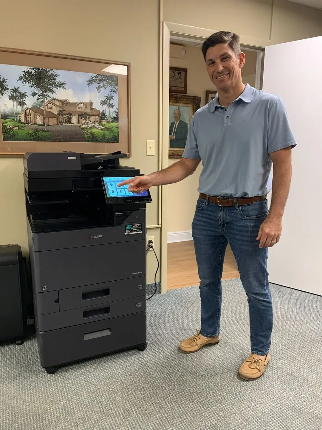 South Florida office customer receiving orientation on a multifunction copier